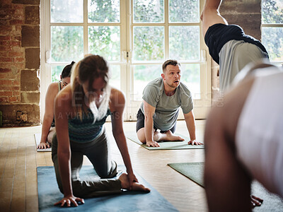 Buy stock photo Yoga, class and people stretching in exercise, workout or training on mat for health and wellness. Fitness, gym or group on floor in pilates and movement of body for self care and flexibility