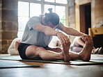 Group, man and stretching for exercise, yoga or legs in gym, class or studio with mindfulness or zen. Pilates, person and workout for wellness, healthy body or balance in fitness center for posture