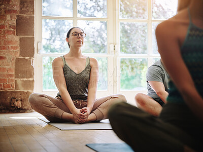 Buy stock photo Woman, yoga and zen class in meditation, spiritual wellness or easy pose for mindfulness or awareness. Calm female person, people or yogi group in pilates for workout, exercise or health in fitness