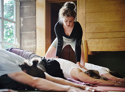 Buy stock photo Yoga, personal trainer and people stretching in class for fitness, exercise and wellness in studio. Health club, childs pose and instructor with group for flexibility workout, balance and coaching