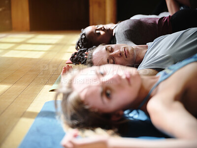 Buy stock photo Meditation, savasana and yoga, people on floor in gym for fitness, health and mindfulness. Relax, calm and breathing, group training for mind exercise and body wellness with peace, zen and balance.