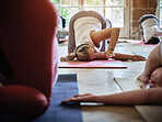 Woman, yoga or class for stretching arm, breathing or healing in zen studio for body flexibility. Community, relax or group of calm people in pilates with mindfulness, support or wellness together