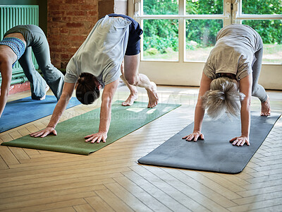 Buy stock photo Group, people and stretching legs for pilates, workout and exercise in fitness centre or gym with mat. Wellness, zen and women with yoga, physical activity and training on floor of studio for balance