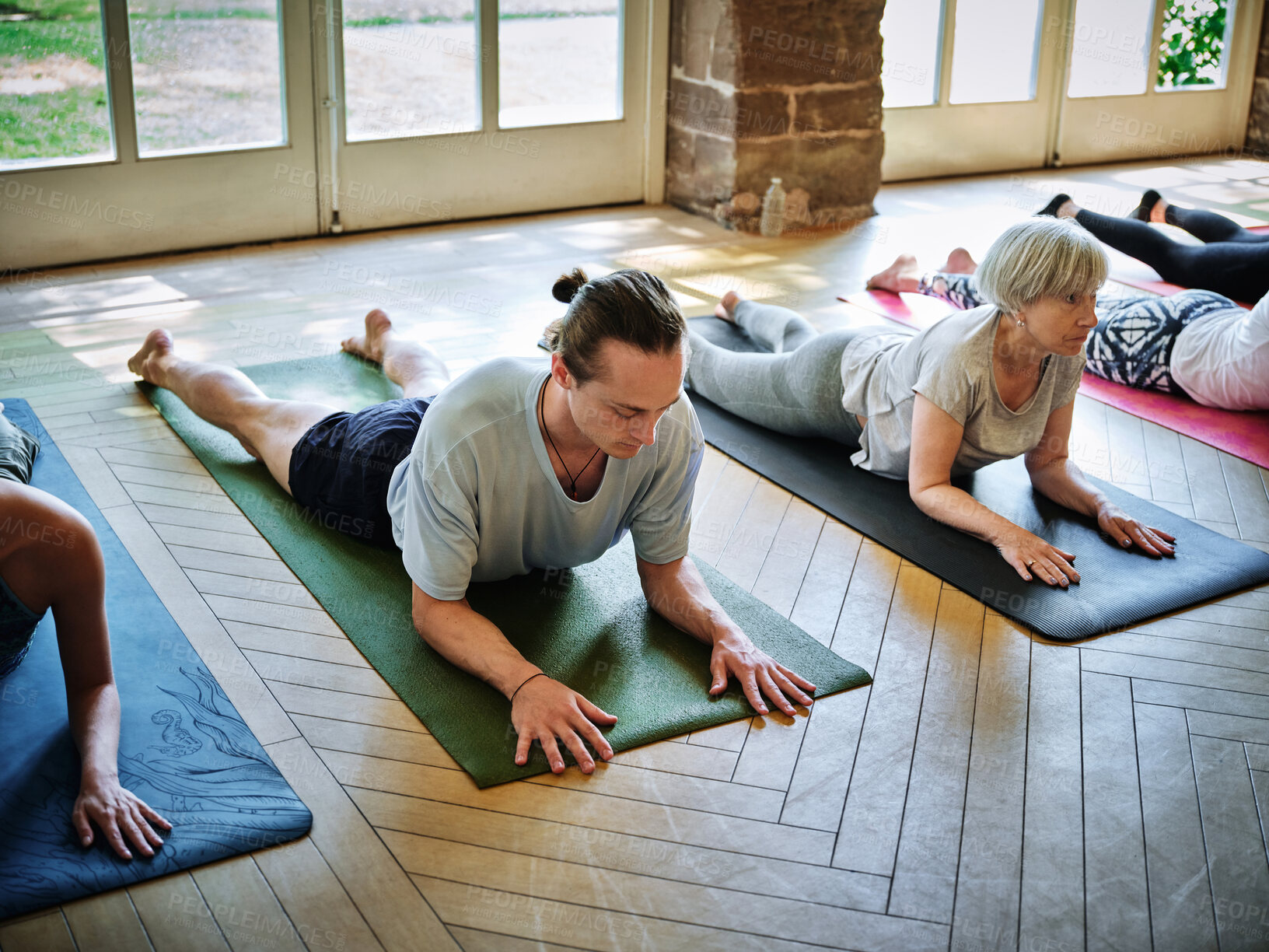 Buy stock photo Senior woman, relax or yoga class for body balance, breathing or healing in studio for flexibility. Community, peace or group of calm people in pilates with mindfulness, support or wellness together 