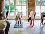 Group, people or stretching for yoga, workout and exercise in fitness centre or gym with mat. Wellness, zen or women and pilates, physical activity and training on floor of studio for balance or body