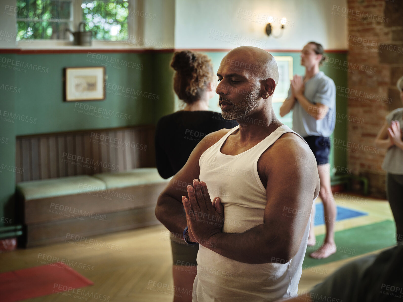 Buy stock photo Namaste, yoga and man in meditation class, spiritual mindfulness and peace. Prayer hands, calm and Indian person in breathing exercise, fitness and zen for healthy body, wellness and relax in gym