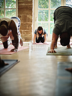 Buy stock photo Yoga class, fitness and people stretching for exercise, workout and wellness with peace, calm and balance. Group on floor in cat cow to downward facing dog pose for pilates, studio training or health