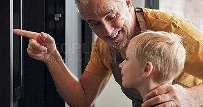 Buy stock photo Grandfather, child and cooking at oven in kitchen, care and support or learning together in home. Happy grandpa, boy and kid baking, pointing and family waiting, bonding or smile for dessert in house