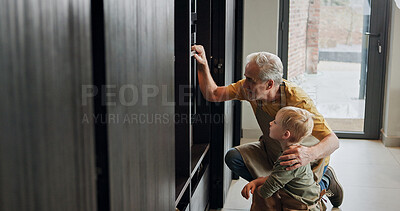 Buy stock photo Grandfather, child and baking at oven in kitchen, care and support or learning together in home. Grandpa, boy and kid cooking, waiting and love of family bonding, watching or prepare dessert in house