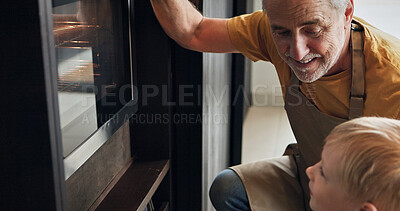 Buy stock photo Oven, baking and mature man with child in kitchen watching cookies cooking together in home or retirement. Teaching, skills and development of kid with grandfather preparing dessert, food or dinner