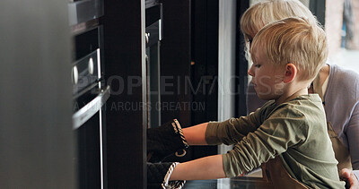 Buy stock photo Oven, baking and mature woman with child in home together with cookies in kitchen. Cooking, skills and development of kid helping grandmother with preparing dessert, food or bonding in retirement