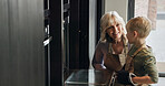 Oven, baking and mature woman with child in kitchen learning a recipe together in home or retirement. Cooking, skills and development of kid with grandmother preparing dessert, food or cookies
