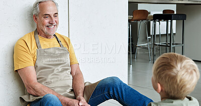 Buy stock photo Floor, home and grandparent with child talking for bonding, relationship and relax on weekend. Retirement, family home and happy grandfather with young boy sitting for conversation, chat and speaking