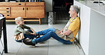 Floor, kitchen and grandfather with child talking for bonding, relationship and relax on weekend. Retirement, family and happy grandpa with young boy sitting for conversation, chat and speaking