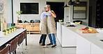 Senior, couple and dancing in living room or happy with bonding, retirement and marriage in apartment. Elderly, man or woman and dance for relationship, embrace or romance with smile in house or home