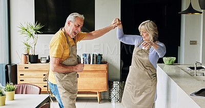Buy stock photo Senior, couple and dancing in living room or energy with bonding, retirement and marriage in apartment. Elderly, man or woman with dance for relationship, apron or romance with happy in house or home
