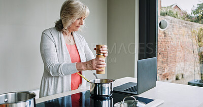 Buy stock photo Cooking, senior woman and laptop in kitchen with recipe, online website and food planning in a home. Stove, web and house with computer and pepper with meal and dinner with internet and diet ideas