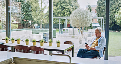 Buy stock photo Phone, search and senior man in a house with social media, streaming for subscription service. Smartphone, app or old male person enjoy retirement peace with online reading, chat or web communication