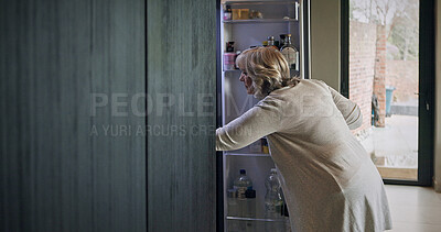 Buy stock photo Fridge, kitchen and elderly woman in home searching for food for lunch, dinner and meal. Retirement, house and mature person by refrigerator for meal preparation for wellness, nutrition and health