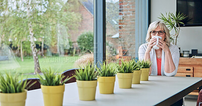 Buy stock photo Senior woman in kitchen, relax with coffee and thinking, calm morning and sitting at table. Home, breakfast drink and  elderly person at tea time with memory, reflection and insight in apartment.
