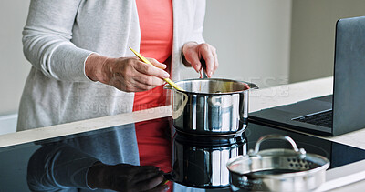 Buy stock photo Cooking, kitchen and person hands with laptop for online recipe for lunch, supper and dinner in home. Wellness, food website and chef on computer with ingredients, vegetables and prepare meal