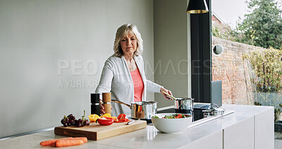 Buy stock photo Food, cooking and senior woman in the kitchen of modern home for healthy or diet supper. Recipe, technology and elderly female person preparing a meal for dinner or lunch with computer at house.