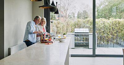 Buy stock photo Senior, couple and cooking in kitchen with tablet for meal prep, recipe idea and digital menu with smile. Elderly, man and woman with technology at home for healthy food ingredients and diet planning