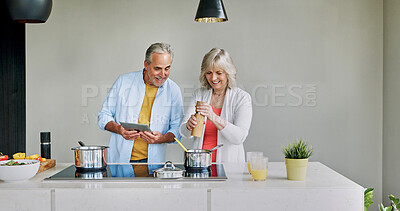 Buy stock photo Senior, couple and cooking in kitchen with tablet for meal prep, recipe idea or digital menu and happy. Elderly, man and woman with technology at home for healthy food ingredients and diet planning