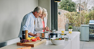 Buy stock photo Cooking, happy and senior couple in kitchen for lunch, supper and prepare food for bonding in home. Marriage, retirement and mature man and woman for meal prep, cutting vegetables and healthy dinner