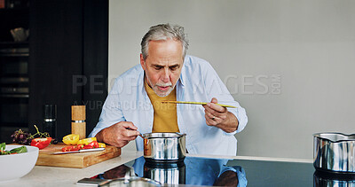 Buy stock photo Cooking, home and senior man taste food for lunch, supper and prepare healthy dinner in kitchen. Retirement, wellness and mature person with natural ingredients, cutting vegetables and organic meal