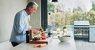 Buy stock photo Cooking, kitchen and senior man with vegetables for lunch, supper and prepare healthy dinner in home. Retirement, chef skills and mature person with natural ingredients, food and meal for nutrition