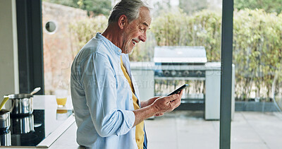 Buy stock photo Senior man in kitchen with smile, phone and morning breakfast with social media meme in house. Home, online recipe and elderly person with smartphone, networking and reading happy email on mobile app