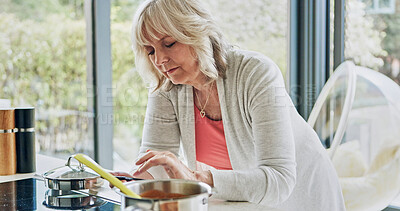 Buy stock photo Cooking, woman and phone in kitchen with recipe, online text and food planning in a home. Stove, web and house with mobile and social media scroll with meal and dinner with app and vegan diet ideas