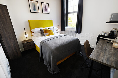 Buy stock photo Hotel, empty room and accommodation with hospitality for vacation for journey, adventure or tourism. Bed, interior design and weekend or holiday in London or lodge for explore, international or trip