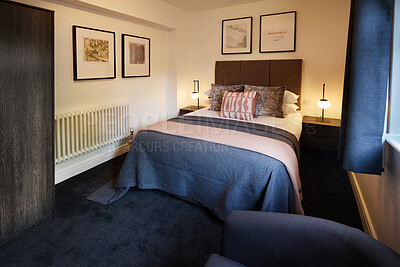Buy stock photo Hospitality, interior and bedroom at luxury accommodation for travel, vacation or holiday in England. Hotel, room and empty elegant suite with classy furniture and decor for weekend trip at lodge.