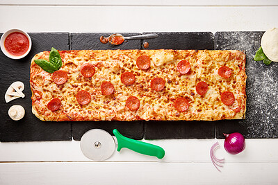 Buy stock photo Top view, fast food and gourmet of pizza with preparation for dinner, baking process and ingredients in kitchen. Patisserie, napoli sauce and onion with mushroom in restaurant or cafe from above
