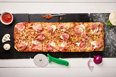 Top view, fast food and gourmet of pizza with meat for dinner preparation, baking process and ingredients in kitchen. Patisserie, napoli sauce and onion with mushroom in restaurant or cafe from above