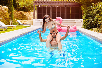 Buy stock photo Happy, couple and playing on shoulders in swimming pool outdoor with love, support and bonding in water for romance. Smile, man and woman relax for trust, care and game with freedom on holiday