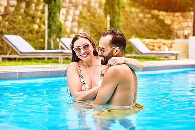 Buy stock photo Smile, couple and hug with love in swimming pool outdoor for bonding together, relax and water at summer house. Happy, man and woman with embrace for romance, care and support by poolside on break