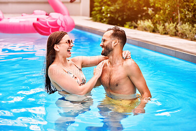 Buy stock photo Fun, swimming pool and happy couple together on holiday, vacation or travel outdoor. Swimmer, man and woman laugh in water to relax on summer date for love, embrace or romantic getaway in Australia