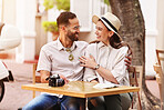 Happy couple, hug and relax with date at cafe for sightseeing or outdoor bonding together. Young man, woman or tourists enjoying romantic getaway, reservation or holiday trip outside coffee shop