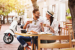 Happy couple, hug and relax with coffee at cafe for travel, love or outdoor bonding together. Young man, woman or tourists enjoying romantic getaway, reservation or holiday trip outside restaurant
