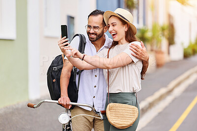 Buy stock photo Outdoor, couple and selfie with bicycle on vacation, holiday adventure and tourists with photography. Happy people, man and woman with hug, document experience and bonding on honeymoon trip in France