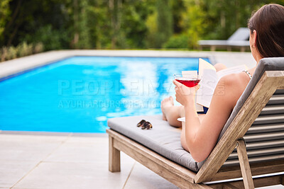 Buy stock photo Swimming pool, reading and woman with cocktail for wellness, relax and luxury holiday in summer. Water, book and female person at resort or hotel for experience, travel and calm for vacation in Miami