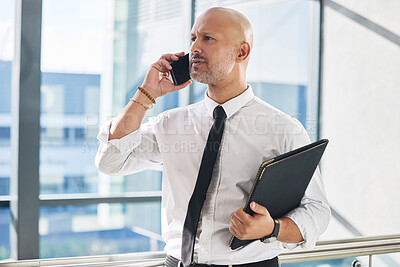 Buy stock photo Phone call, confused and businessman in office for thinking, contact or company update in city. Male lawyer, frown or talking on cell for communication, concern or excuse from late client for consult