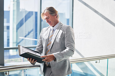 Buy stock photo Document, reading and businessman with file in office with b2b finance contract policy. Paperwork, corporate and mature financial analyst with company revenue, profit or budget information report.