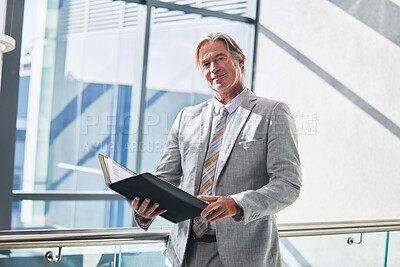 Buy stock photo Mature man, face and documents in office with confidence, pride and legal paperwork for court case. Corporate lawyer, portrait and happy in workplace for success, justice and law firm with experience
