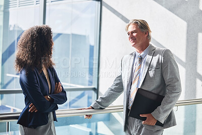 Buy stock photo Office, document and discussion of business people for meeting, representation and advocacy for immigration. Career, female person and mature lawyer with file for legal advice, justice and working