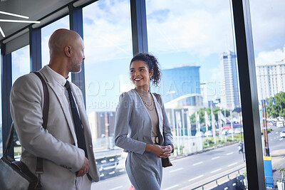Buy stock photo Collaboration, smile and walking with corporate people in airport together for international travel. Business, conversation or teamwork with man and woman employee on bridge in terminal for flight