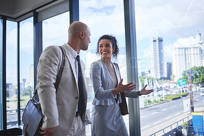 Buy stock photo Collaboration, intro and walking with business people in airport together for international travel. Conversation, showing or teamwork with man and woman employee on bridge in terminal for flight